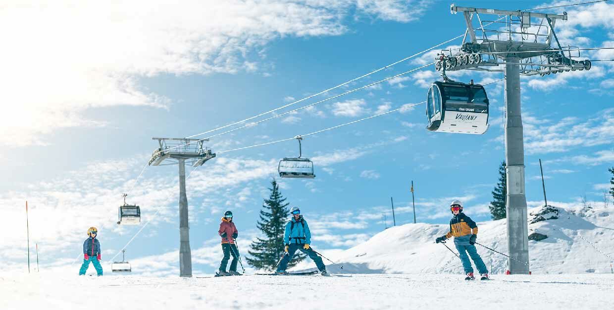 Famille au ski à Vaujany, espace Alpe d'Huez
