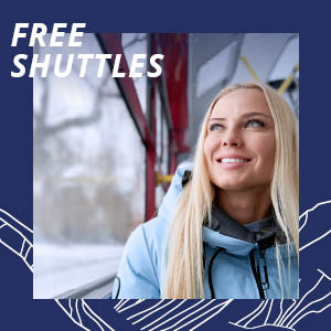 Young woman smiling in a bus and watching winter's landscapes around